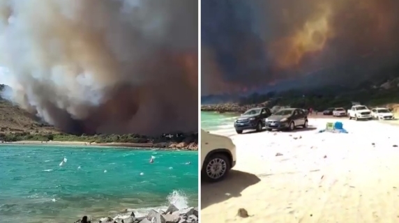 Plaja yakın yangının videosu: Yüzücüler arasında korku