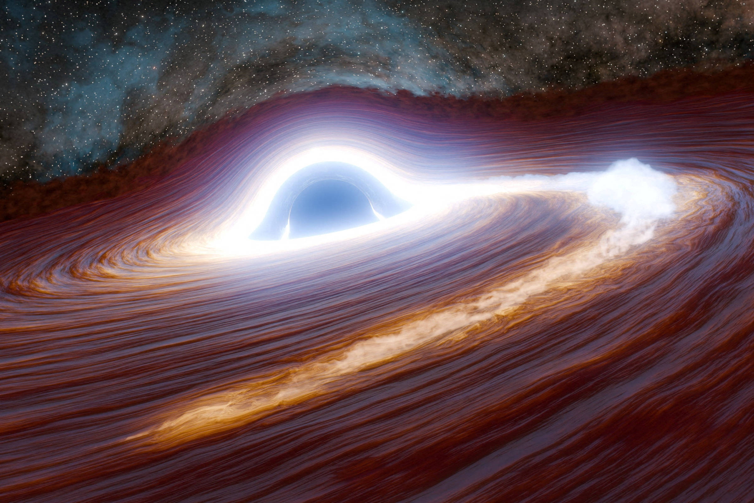 Un buco nero divoratore di stelle scatena un'esplosione energetica da record.