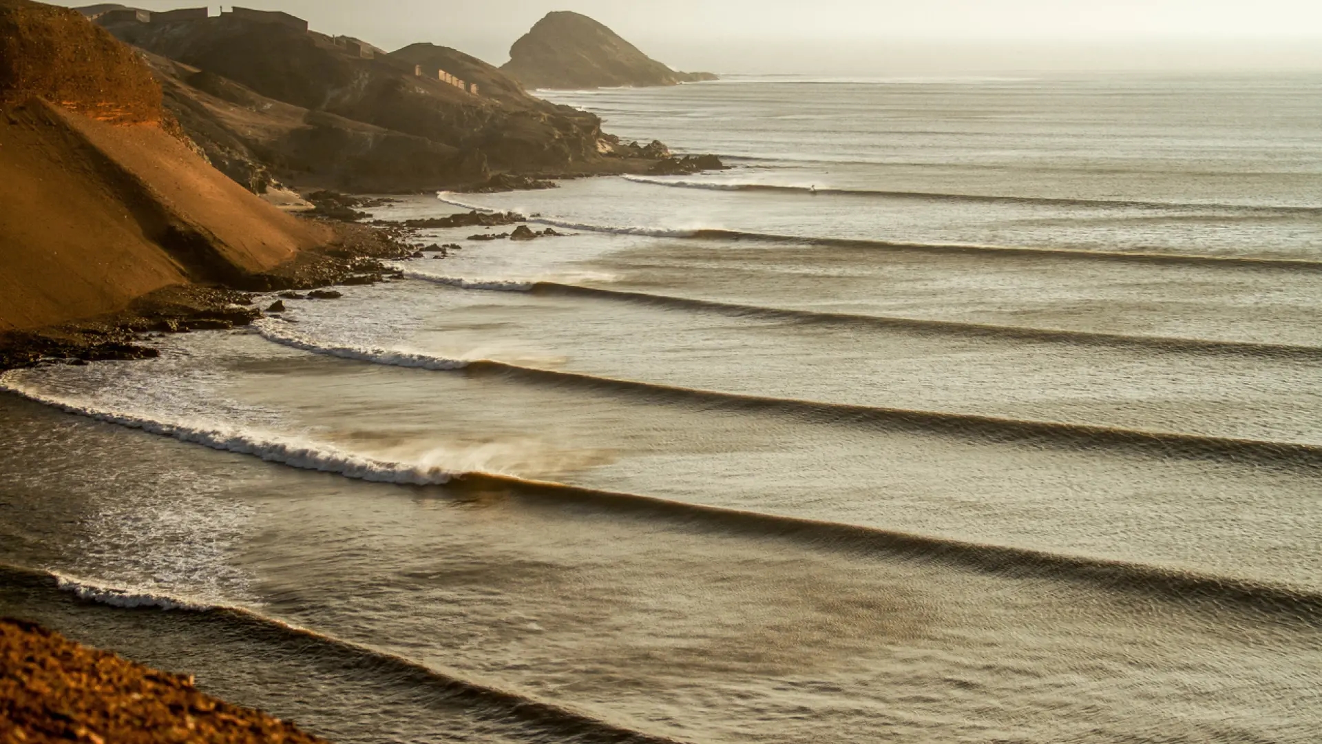 The curious town where "the longest and most perfect waves in the world" are produced