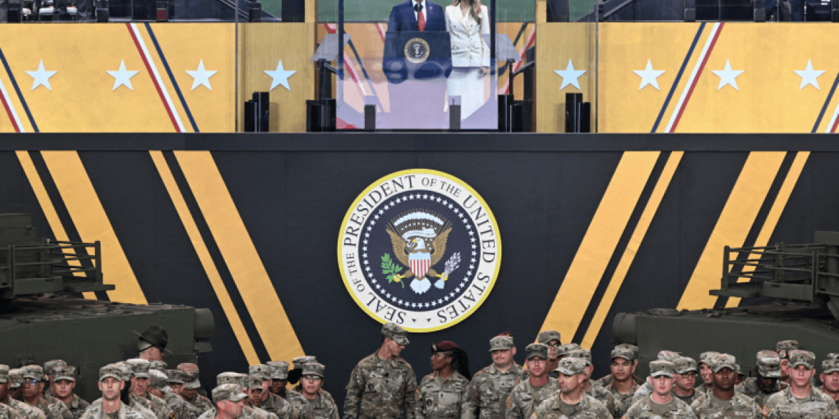 Donald Trump enjoys military parade as hundreds of thousands protest against him