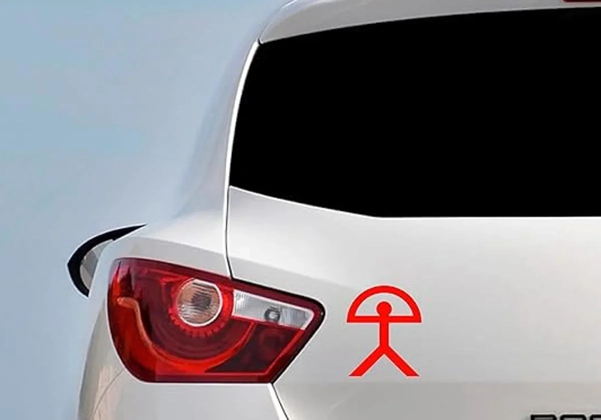 What does this symbol on the back of cars mean?