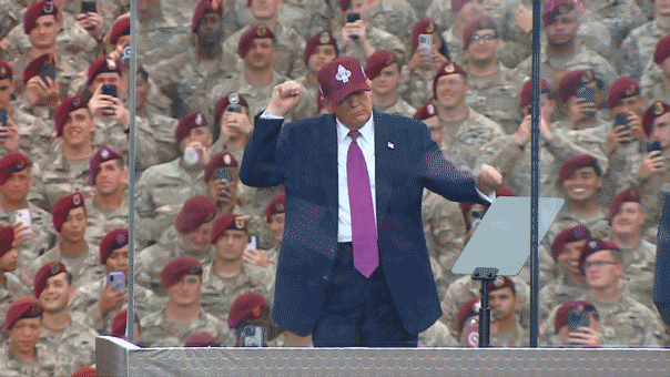 Trump dances with soldiers at Fort Bragg as crowd erupts in patriotic 'USA' chants