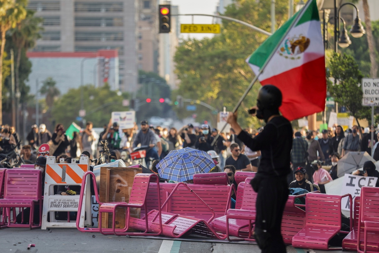 Trump will 'strengthen' migrant deportations after protests against raids